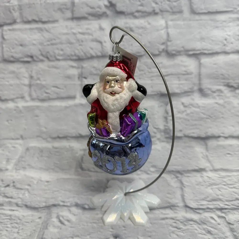Celebrations Radko 2014 Blown Glass Ornament Santa in Present Bag w/ tags